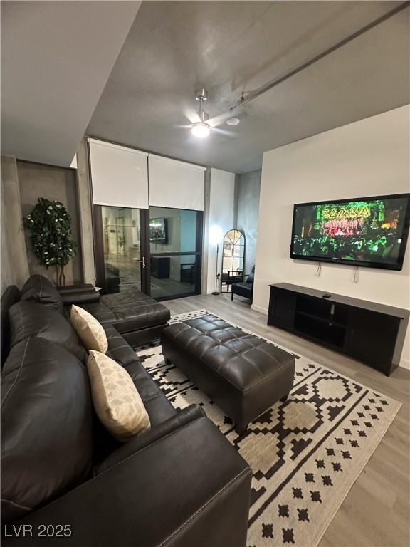 353 E Bonneville Ave Unit 449, Las Vegas, NV 89101 - living area featuring wood finished floors and baseboards