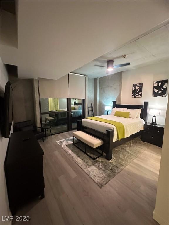 353 E Bonneville Ave Unit 449, Las Vegas, NV 89101 - bedroom featuring wood finished floors