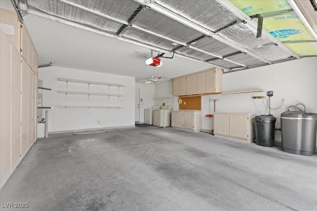 2154 Eagle Sticks Dr, Henderson, NV 89012 - garage featuring separate washer and dryer and a garage door opener