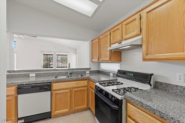 2154 Eagle Sticks Dr, Henderson, NV 89012 - kitchen with white dishwasher, gas range, under cabinet range hood, lofted ceiling, and light tile patterned flooring