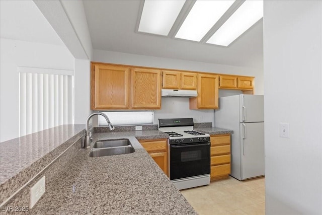2154 Eagle Sticks Dr, Henderson, NV 89012 - kitchen featuring white appliances, under cabinet range hood, and light tile patterned floors