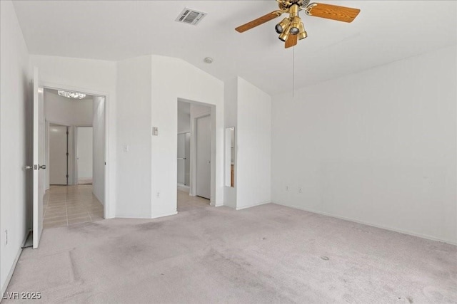2154 Eagle Sticks Dr, Henderson, NV 89012 - unfurnished bedroom featuring light colored carpet, lofted ceiling, and a ceiling fan