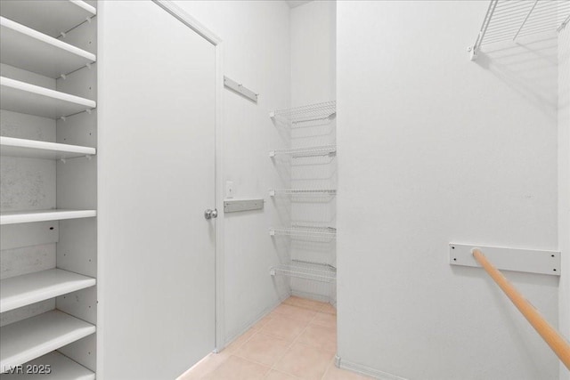 2154 Eagle Sticks Dr, Henderson, NV 89012 - spacious closet featuring light tile patterned floors