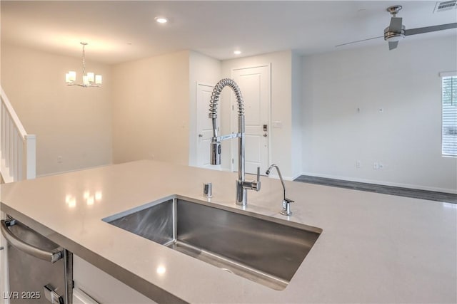 545 Thea St Unit 1315, Henderson, NV 89052 - kitchen with recessed lighting, dishwasher, a chandelier, pendant lighting, and light countertops