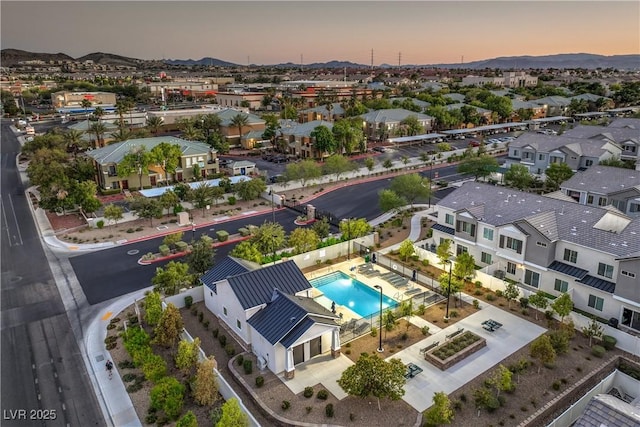 545 Thea St Unit 1315, Henderson, NV 89052 - aerial view at dusk of a mountain view, view of pool area, and a residential view