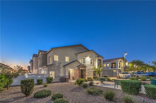 545 Thea St Unit 1315, Henderson, NV 89052 - rear view of property with stucco siding
