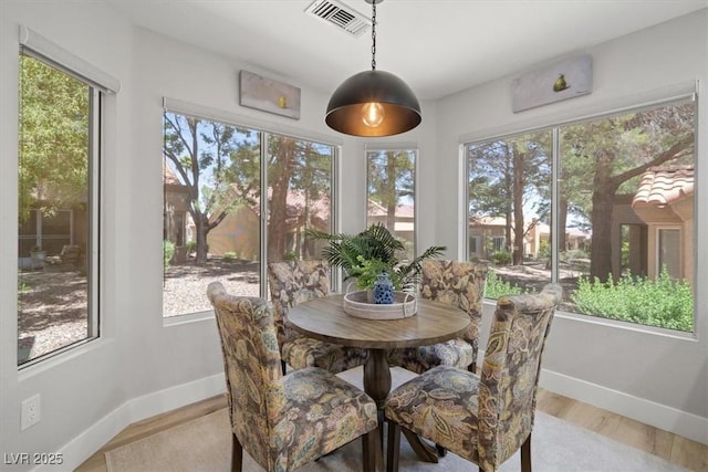 9540 Eagle Valley Dr, Las Vegas, NV 89134 - dining room with light wood-style floors and baseboards