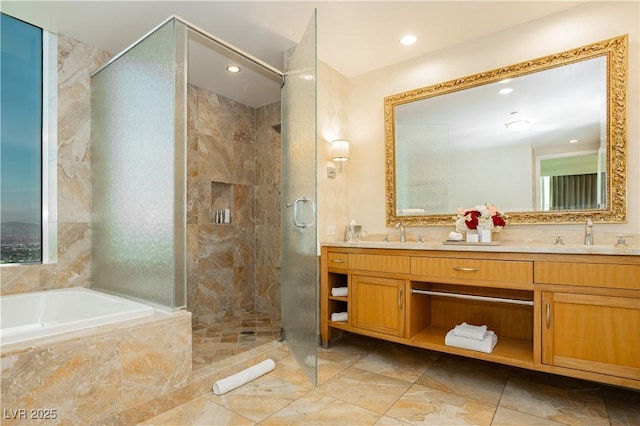 2000 Fashion Show Dr Unit 5022, Las Vegas, NV 89109 - bathroom with double vanity, a garden tub, a stall shower, and recessed lighting