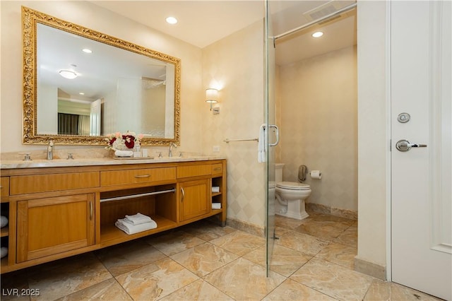 2000 Fashion Show Dr Unit 5022, Las Vegas, NV 89109 - bathroom featuring double vanity and recessed lighting