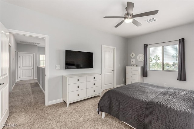 1034 Fish Pond Ave, Henderson, NV 89014 - bedroom with light colored carpet and ceiling fan