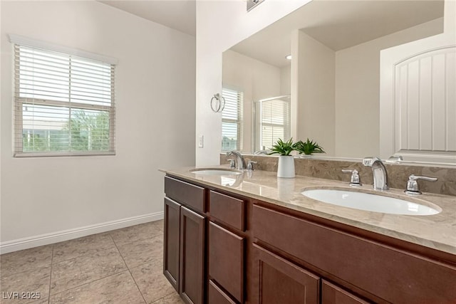 1034 Fish Pond Ave, Henderson, NV 89014 - bathroom with double vanity, tile patterned floors, and a shower stall