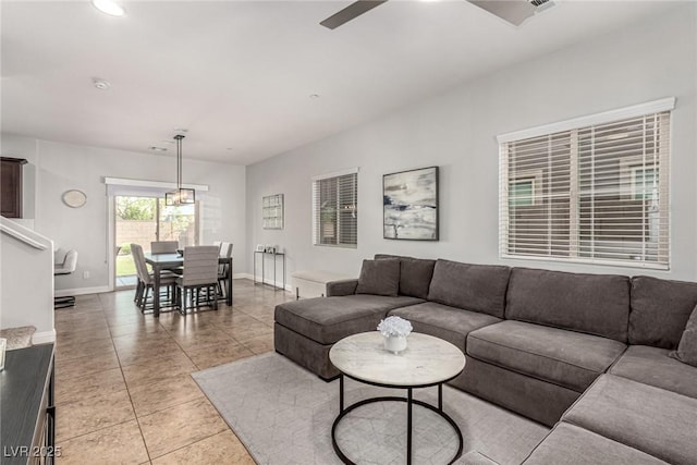 1034 Fish Pond Ave, Henderson, NV 89014 - living area with light tile patterned flooring, ceiling fan, and recessed lighting