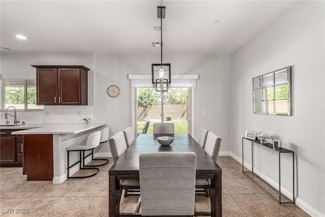 1034 Fish Pond Ave, Henderson, NV 89014 - dining area featuring recessed lighting and light tile patterned floors