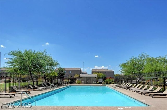 1034 Fish Pond Ave, Henderson, NV 89014 - community pool featuring a patio