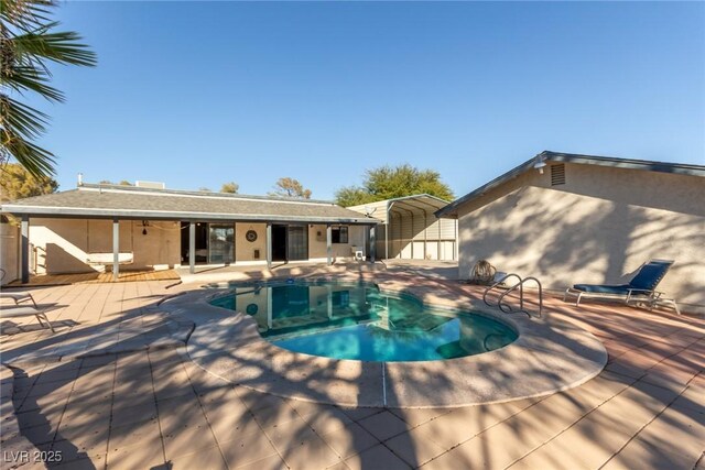 5905 Paseo Montana, Las Vegas, NV 89108 - outdoor pool featuring a patio area