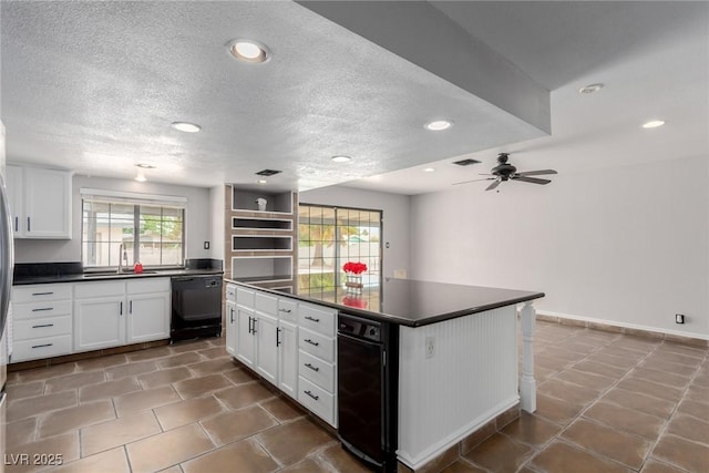 5905 Paseo Montana, Las Vegas, NV 89108 - kitchen with dishwasher, dark countertops, white cabinets, recessed lighting, and a textured ceiling
