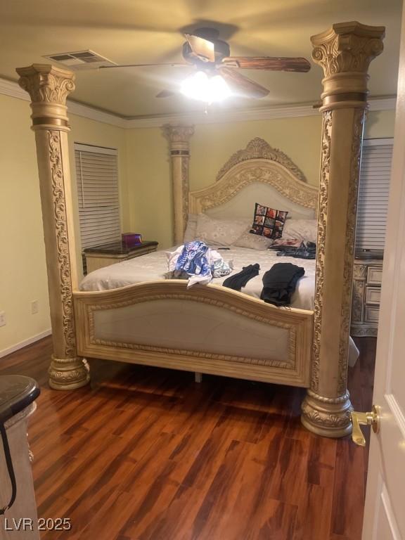3128 Spring City Ave, North Las Vegas, NV 89081 - bedroom with crown molding, wood finished floors, ceiling fan, and ornate columns