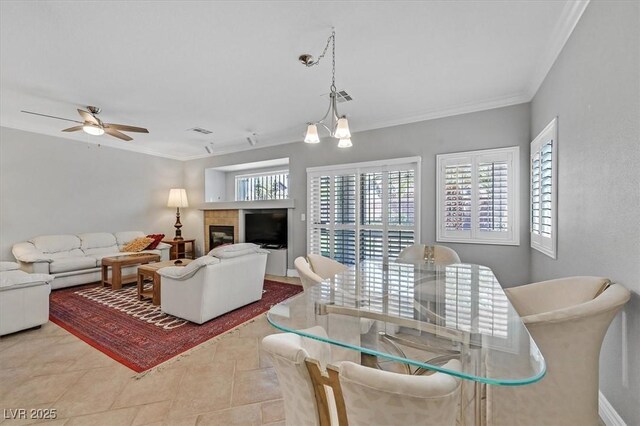 5918 Terra Grande Ave, Las Vegas, NV 89122 - living room with ceiling fan, crown molding, and tile patterned floors