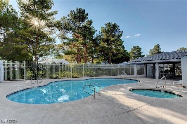 2132 Chertsey Dr Unit B, Las Vegas, NV 89108 - community pool featuring a hot tub and a patio