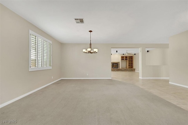 2262 Alanhurst Dr, Henderson, NV 89052 - unfurnished room with a chandelier and light colored carpet