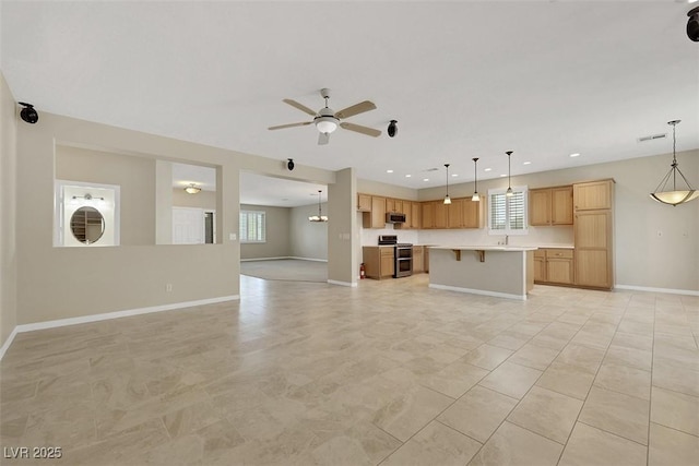 2262 Alanhurst Dr, Henderson, NV 89052 - unfurnished living room featuring plenty of natural light, a ceiling fan, and recessed lighting