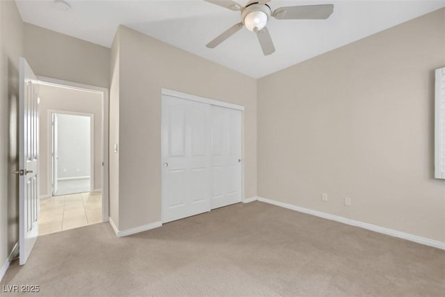 2262 Alanhurst Dr, Henderson, NV 89052 - unfurnished bedroom with light colored carpet, a closet, and a ceiling fan