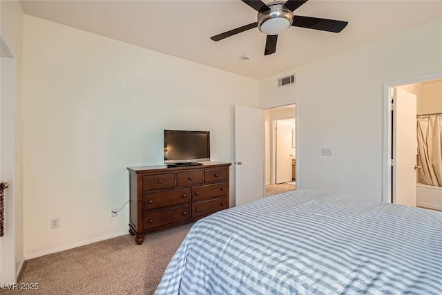 9050 Warm Springs Rd Unit 2050, Las Vegas, NV 89148 - carpeted bedroom featuring a ceiling fan and ensuite bath