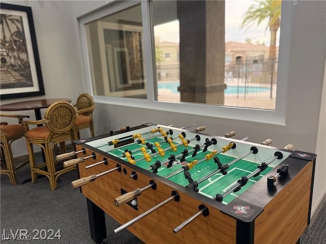 9050 Warm Springs Rd Unit 2050, Las Vegas, NV 89148 - game room featuring carpet and healthy amount of natural light