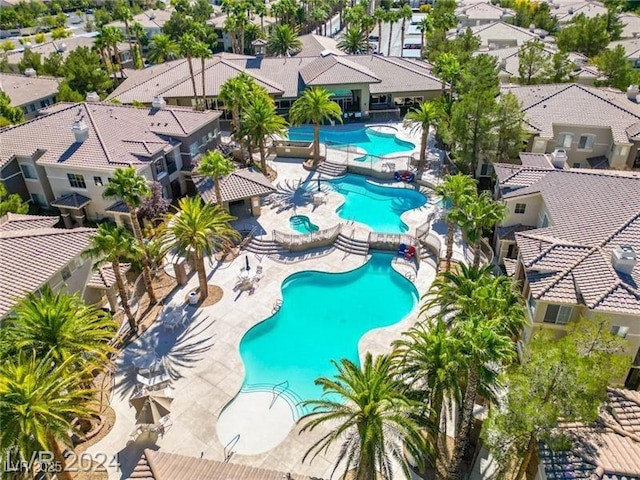 9050 Warm Springs Rd Unit 2050, Las Vegas, NV 89148 - community pool featuring a residential view and a patio area