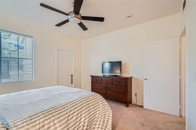 9050 Warm Springs Rd Unit 2050, Las Vegas, NV 89148 - bedroom with light colored carpet and ceiling fan