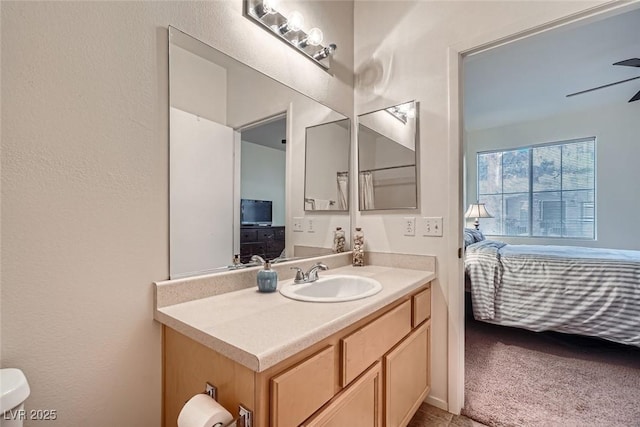 9050 Warm Springs Rd Unit 2050, Las Vegas, NV 89148 - bathroom featuring ensuite bathroom, vanity, and ceiling fan