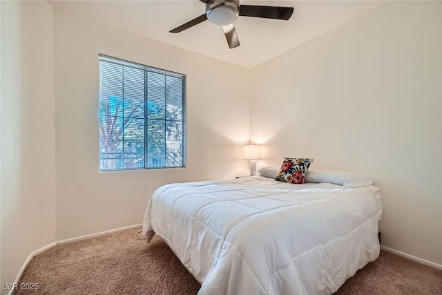 9050 Warm Springs Rd Unit 2050, Las Vegas, NV 89148 - carpeted bedroom with baseboards and a ceiling fan