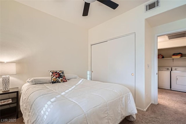 9050 Warm Springs Rd Unit 2050, Las Vegas, NV 89148 - bedroom with washer and clothes dryer, carpet floors, a closet, a ceiling fan, and vaulted ceiling