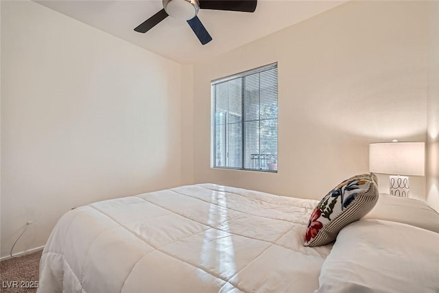 9050 Warm Springs Rd Unit 2050, Las Vegas, NV 89148 - carpeted bedroom with a ceiling fan and baseboards