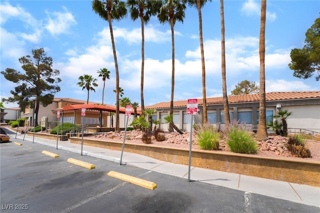 3151 Soaring Gulls Dr Unit 2180, Las Vegas, NV 89128 - uncovered parking lot with a residential view