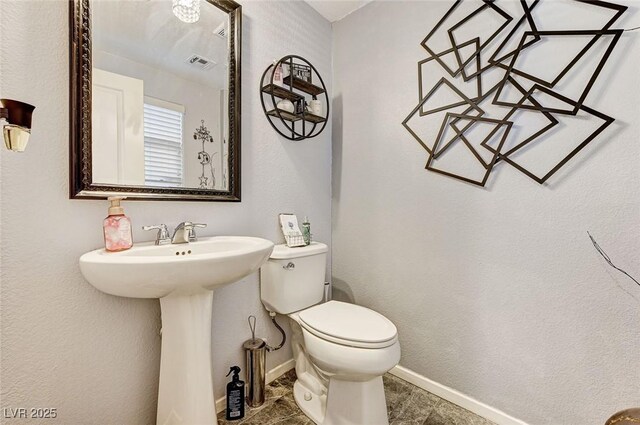 2370 Via Firenze, Henderson, NV 89044 - half bathroom featuring toilet and tile patterned flooring