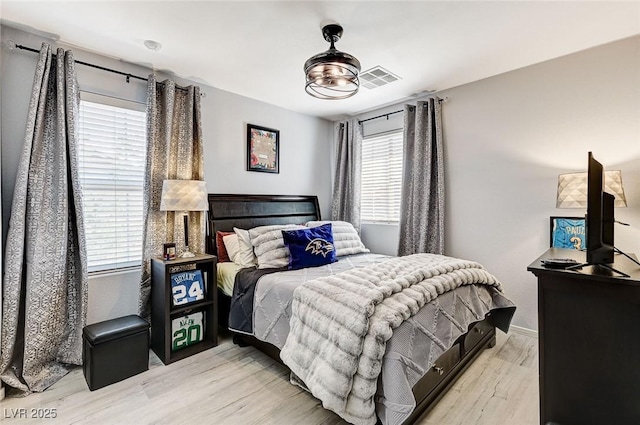 2370 Via Firenze, Henderson, NV 89044 - bedroom with light wood-type flooring and baseboards