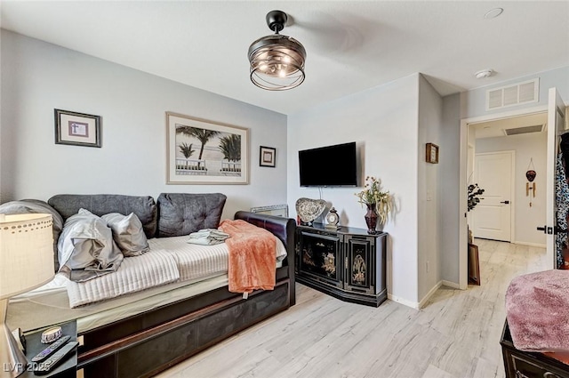 2370 Via Firenze, Henderson, NV 89044 - bedroom with light wood-style flooring and baseboards