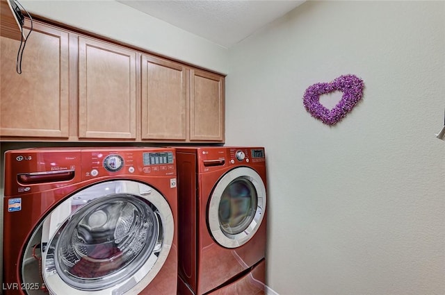 2370 Via Firenze, Henderson, NV 89044 - laundry room featuring cabinet space and washer and clothes dryer