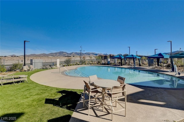 2370 Via Firenze, Henderson, NV 89044 - community pool with a mountain view and a patio