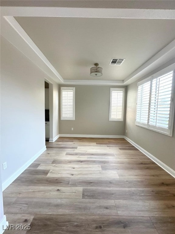 776 Tillis Pl, Las Vegas, NV 89138 - spare room with plenty of natural light and wood finished floors