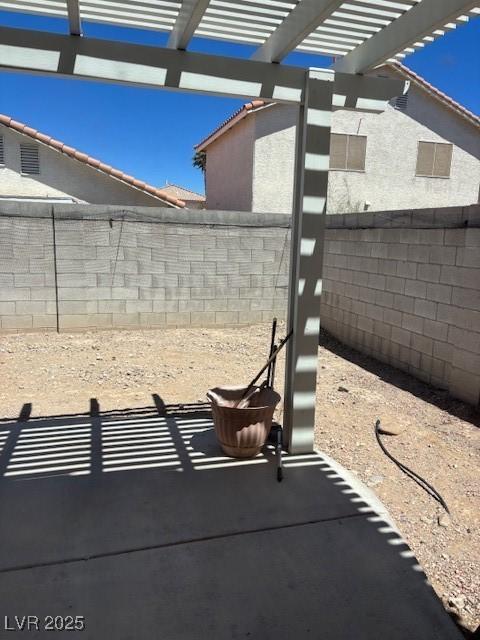 9940 Trailing Vine St, Las Vegas, NV 89183 - fenced backyard featuring a pergola