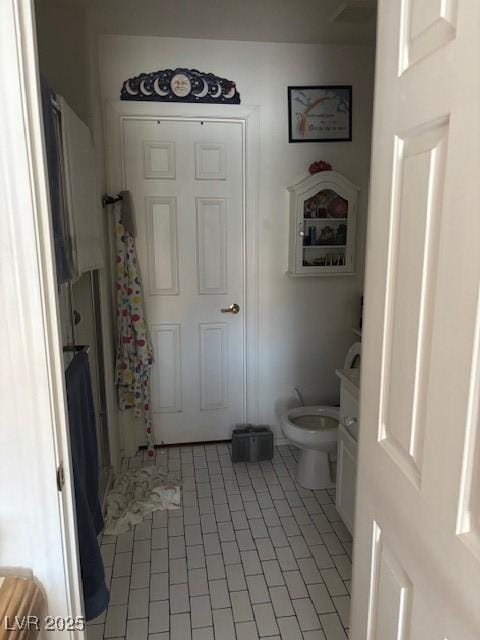 9940 Trailing Vine St, Las Vegas, NV 89183 - bathroom featuring tile patterned floors and vanity