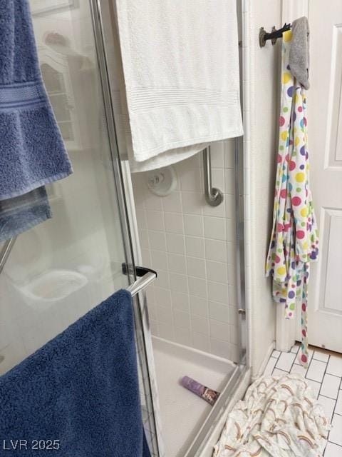 9940 Trailing Vine St, Las Vegas, NV 89183 - bathroom with a shower stall and tile patterned floors