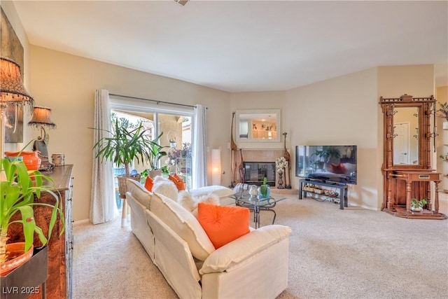 2050 W Warm Springs Rd Unit 1923, Henderson, NV 89014 - carpeted living area with a tile fireplace and baseboards