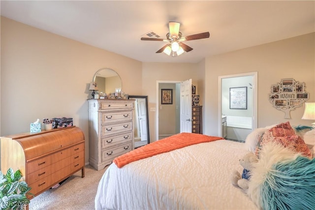 2050 W Warm Springs Rd Unit 1923, Henderson, NV 89014 - bedroom with light colored carpet, a ceiling fan, and ensuite bathroom