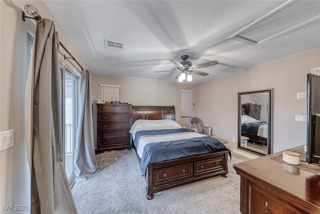 6335 Pacific Sky St, North Las Vegas, NV 89081 - bedroom with light colored carpet, ceiling fan, and attic access
