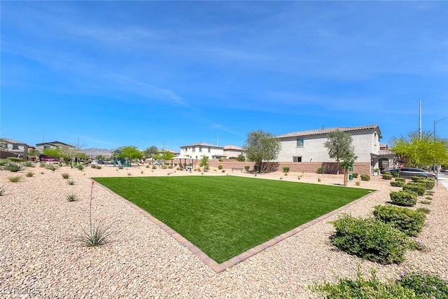 6335 Pacific Sky St, North Las Vegas, NV 89081 - view of grassy yard