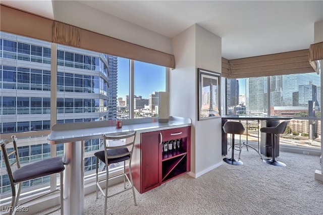 4575 Dean Martin Dr Unit 1112, Las Vegas, NV 89103 - bar with a city view, plenty of natural light, and carpet