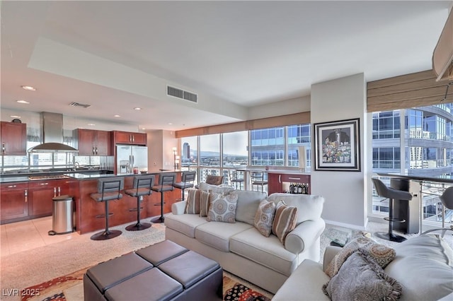 4575 Dean Martin Dr Unit 1112, Las Vegas, NV 89103 - living room featuring plenty of natural light and recessed lighting